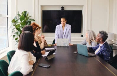A group of businesswomen having a discussion in office.