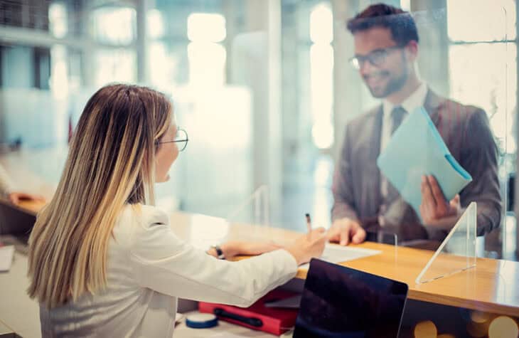 Member at the teller line in a credit union branch