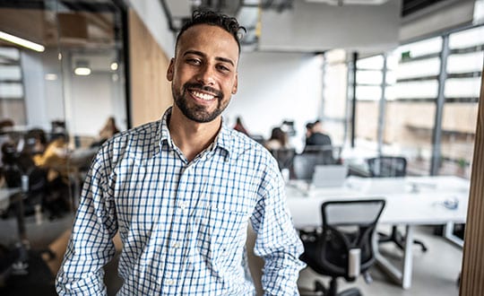 Small business owner in tech forward office space